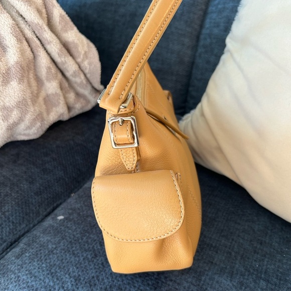 Dooney and Bourke Bag . Medium sized. Has imperfections . - Picture 15 of 17